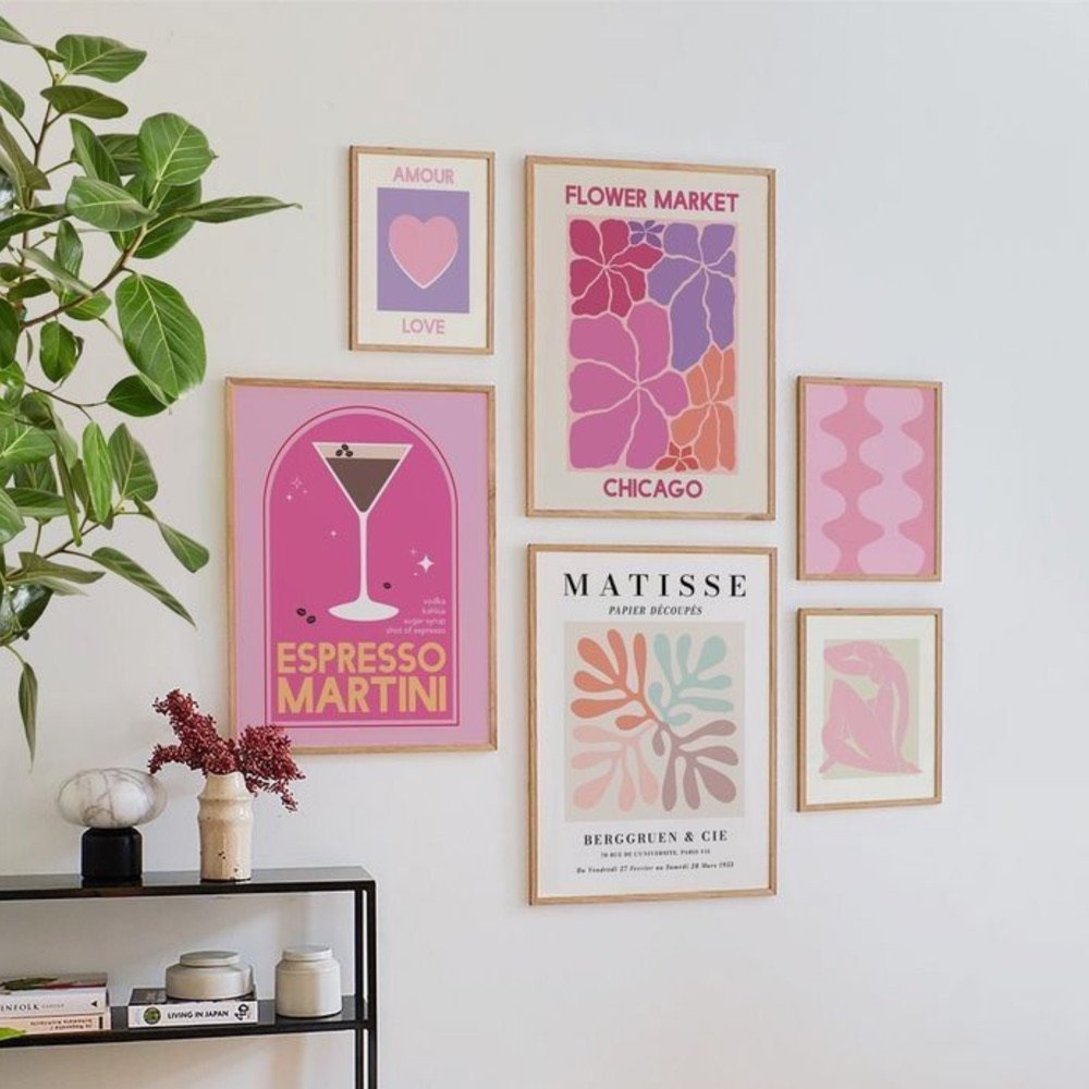 Gallery wall of pink art prints