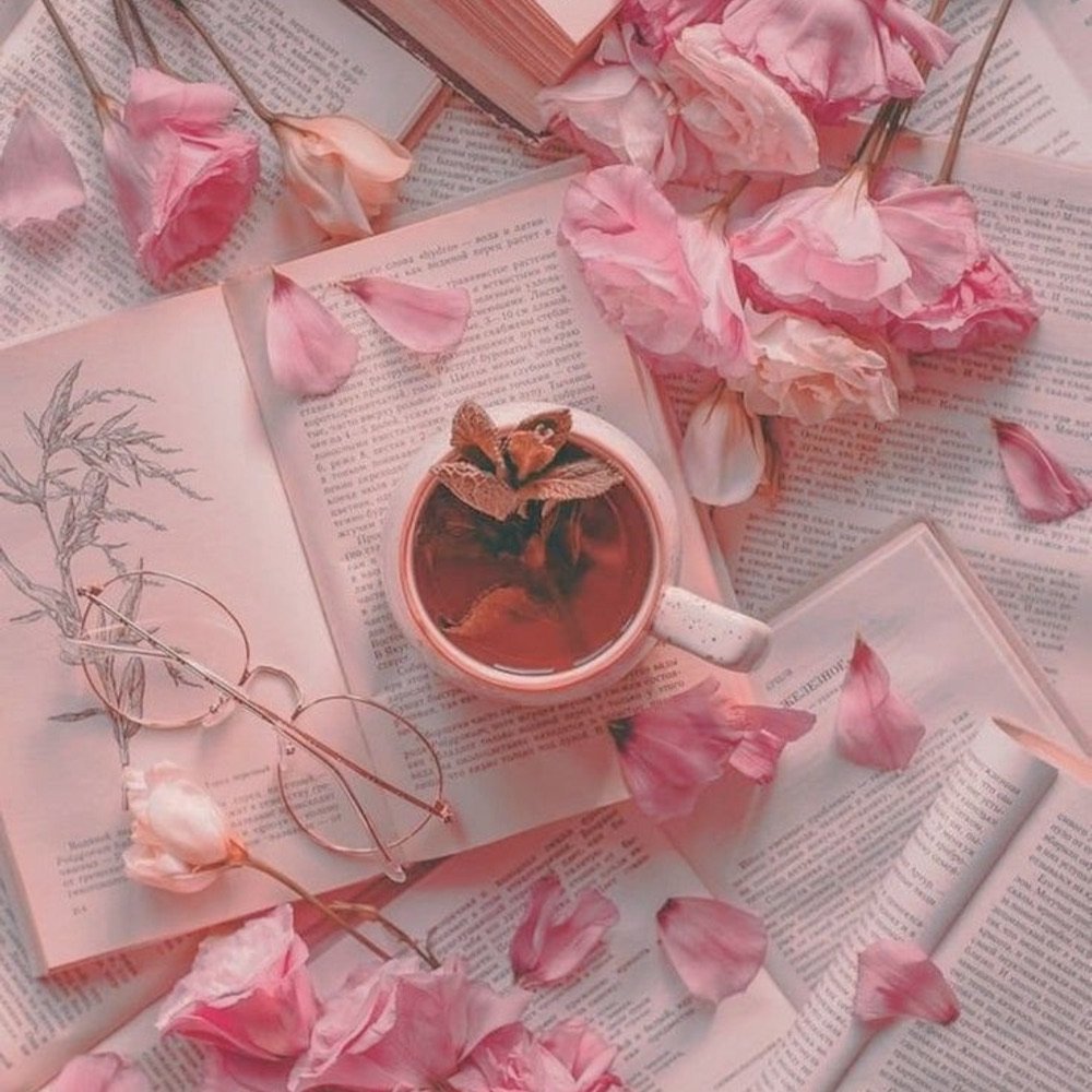 Pink bows and sweets on a pink table