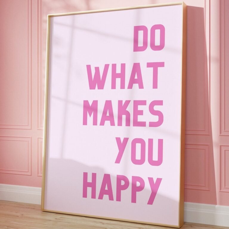 Pink framed print reading Do What Makes You Happy